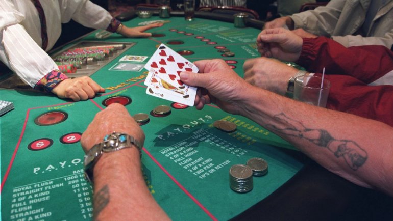 players at the table in the casino