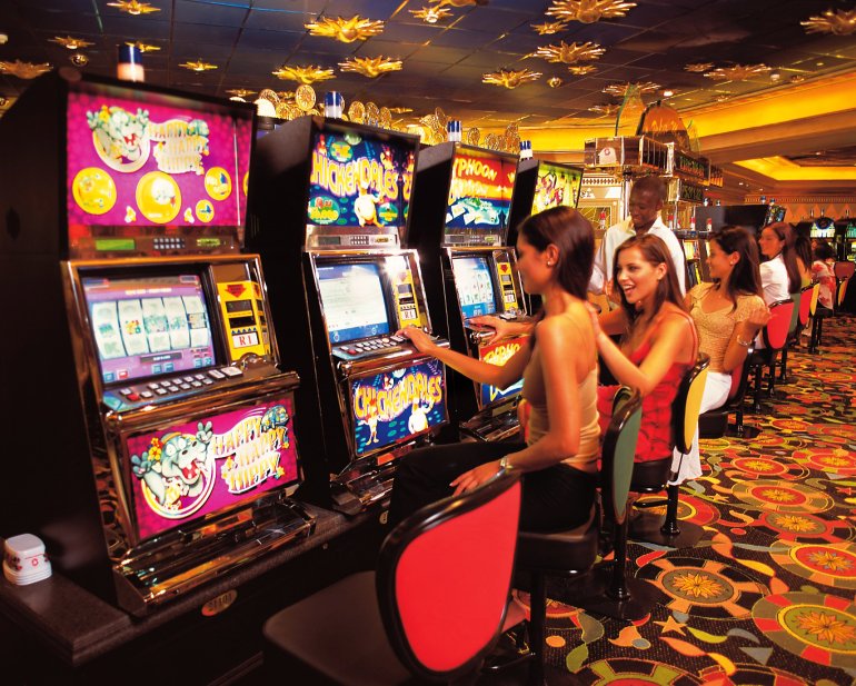 Ladies play on their favorite Lucky pokie in the casino