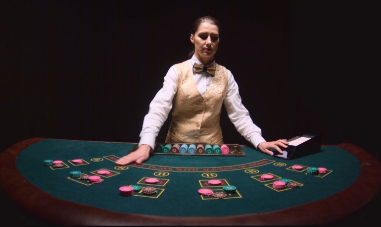 female casino croupier