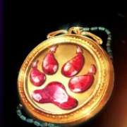 Golden medallion symbol in Jaguar Moon pokie