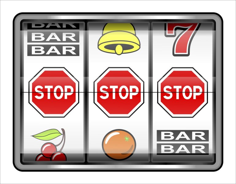 Three stop signs fall out on a pokie