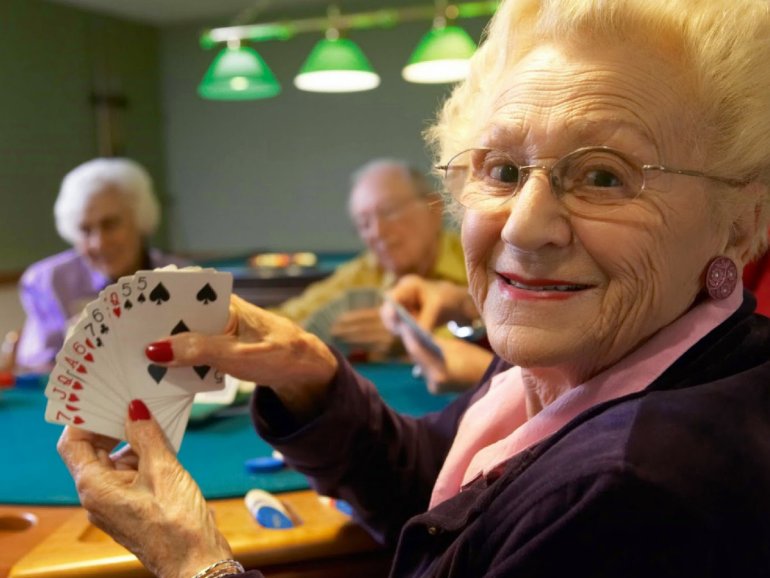An Old Woman Playing Cards