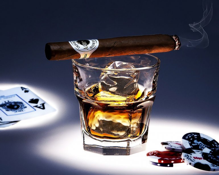 whiskey, cigar, and cards