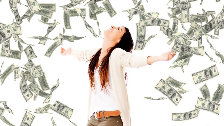 Girl is happy about showering dollar bills